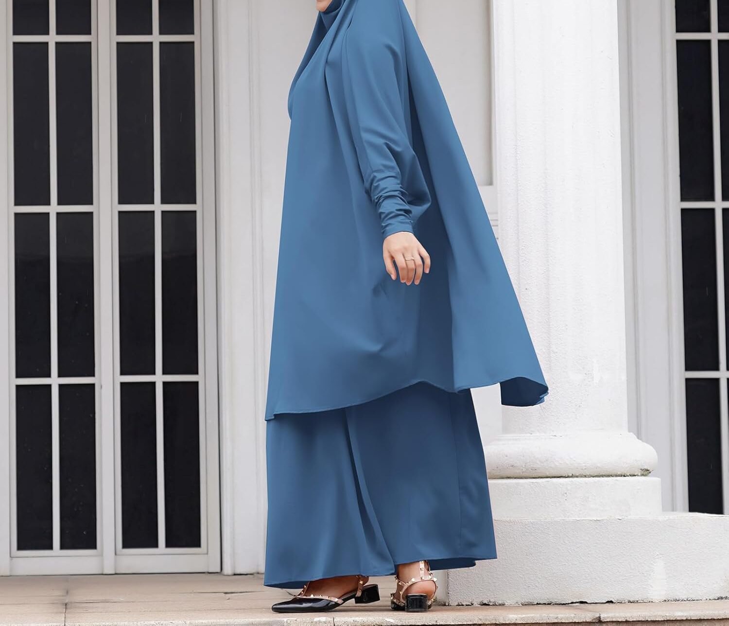 A Muslim women wearing blue burka or Prayer Lebas
